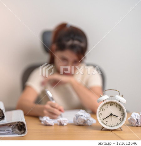 stressed Woman with mistake paper and clock, Tired female businesswoman working overload at office, Exhausted woman with document folder stack at late night in home. Failure, Problem and business 121612646