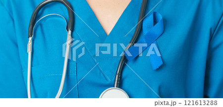 March Colorectal Cancer Awareness month, doctor with dark Blue Ribbon for supporting people living and illness. Healthcare, hope and World cancer day concept 121613288