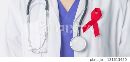 Doctor with Red Ribbon for December World Aids Day, acquired immune deficiency syndrome, multiple myeloma Cancer Awareness month and National Red ribbon week. Healthcare and world cancer day concept 121613420