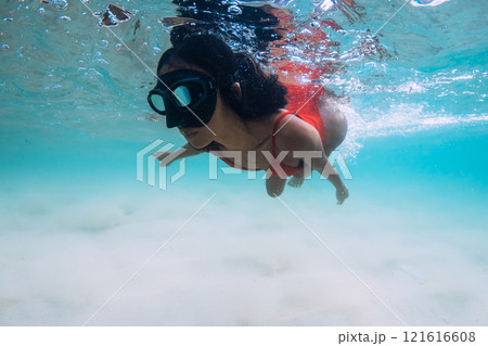 Woman snorkeling in shallow water. Swimming with beauty asian girl in sea 121616608