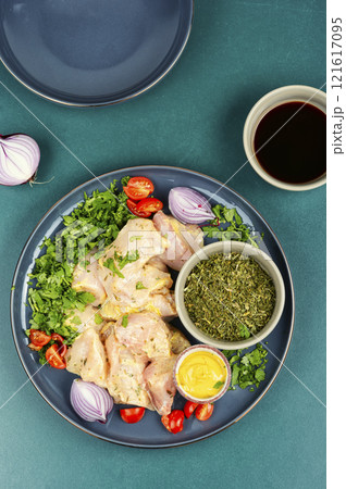 Raw chicken medallions. 121617095