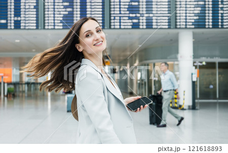 Successful businesswoman at the airport on travel 121618893