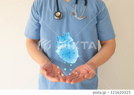 Cardiologist doctor check up heart organ with EKG hologram. Medical technology for diagnose heart disorder and disease of cardiovascular system. Cardiological and world heart day concept. Cardiologist doctor check up heart organ with EKG hologram. Medical technology for diagnose heart disorder and disease of cardiovascular system. Cardiological and world heart day concept. 121620325
