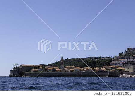 Montenegro, panorama of the Old Town of Budva seen from the sea. Montenegro, panorama of the Old Town of Budva seen from the sea. 121621009