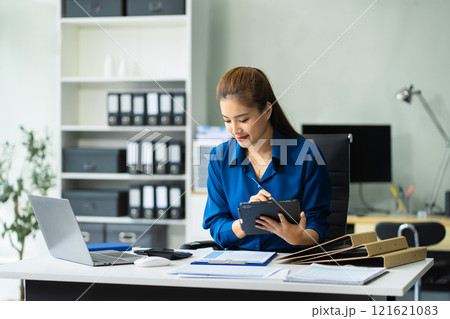Business people working in the work area with laptop and tablet at the desk. business concepts. 121621083