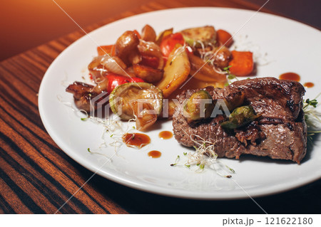 grilled fresh vegetables with meat and rosemary on wooden table grilled fresh vegetables with meat and rosemary on wooden table 121622180