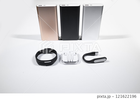 mobile power banks set with portable electronic devices on white background isolated 121622196
