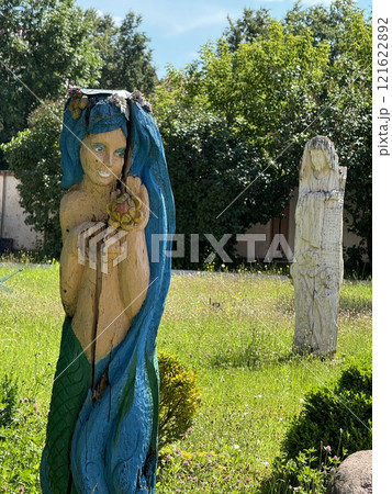 Hand-Carved Mermaid Sculpture with Vibrant Colors 121622892