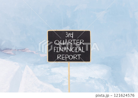 3rd quarter financial report symbol. Concept words 3rd quarter financial report on beautiful black blackboard. Beautiful blue ice background. Business 3rd quarter financial report concept. Copy space. 121624576