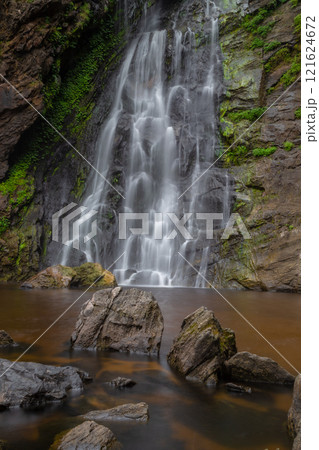 Klong Lan Waterfall is one of the most beautiful and grand waterfalls in Thailand. Below it is a large pool where you can swim. It is located in Khlong Lan Waterfall National Park, Kamphaeng Phet 121624672
