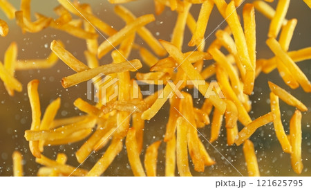 Freeze motion of flying french fries on gradient background 121625795