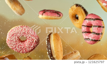 Freeze Motion Shot of Flying Tasty Donuts , Close-up 121625797
