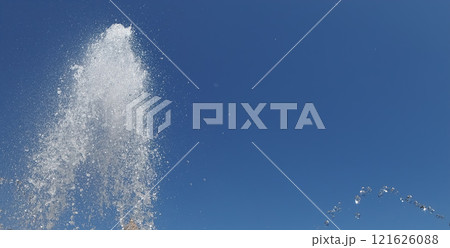 water jet over blue 121626088