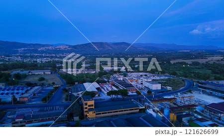 Marble processing factory at dawn with mountains in background Marble processing factory at dawn with mountains in background 121626699