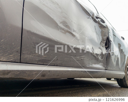Gray Car with Severe Side Panel Damage Gray Car with Severe Side Panel Damage 121626996