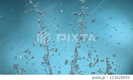 Freeze motion of splashing water on light blue background 121628050