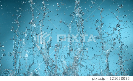 Freeze motion of splashing water on light blue background 121628053