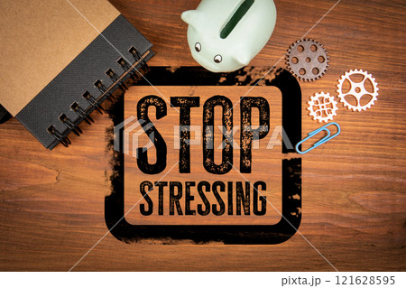 Stop Stressing. Stamp on wood texture background. Office desk 121628595