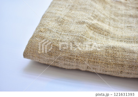 brown sackcloth texture background, folded burlap fabric textile for design 121631393
