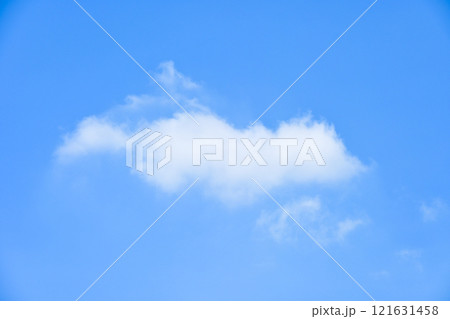 beautiful blue sky and white fluffy single cloud with sunrise in the morning, natural background beautiful blue sky and white fluffy single cloud with sunrise in the morning, natural background 121631458
