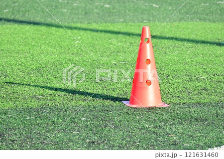 artificial green grass soccer field with orange training cones artificial green grass soccer field with orange training cones 121631460