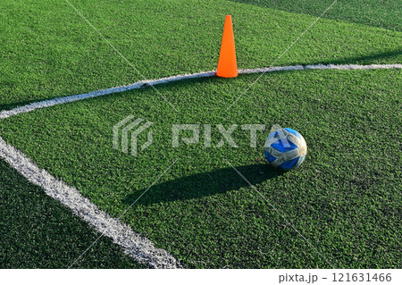 artificial green grass soccer field with training cone and ball artificial green grass soccer field with training cone and ball 121631466