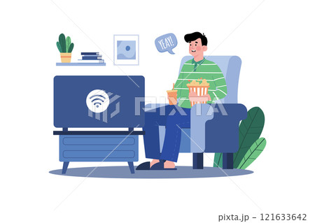 A Male Watching A Movie On The Internet A Male Watching A Movie On The Internet 121633642