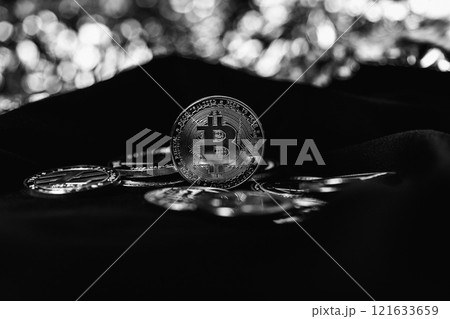 Cryptocurrency coin on black background. The world crisis. Electronic currency. Cryptocurrency coin on black background. The world crisis. Electronic currency. 121633659