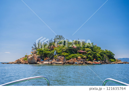 View of the Tu Ton Pagoda Island in Nha Trang. Buddhist temple on an island in the middle of the sea 121635764