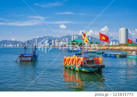Sea view of Nha Trang and the urban landscape with colorful fishing boats. Vietnam Sea view of Nha Trang and the urban landscape with colorful fishing boats. Vietnam 121635773
