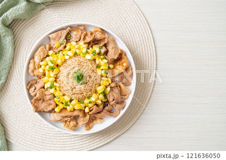 fried rice with pork sliced and corn 121636050