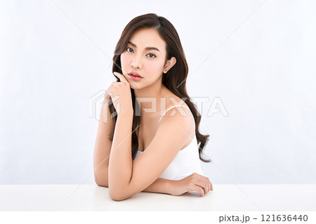 Beautiful young asian woman with clean fresh skin on white background, Face care, Facial treatment, Cosmetology, beauty and spa, Asian women portrait. Beautiful young asian woman with clean fresh skin on white background, Face care, Facial treatment, Cosmetology, beauty and spa, Asian women portrait. 121636440