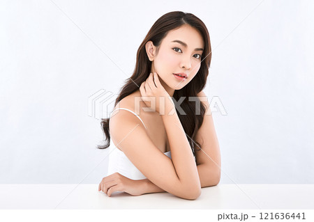 Beautiful young asian woman with clean fresh skin on white background, Face care, Facial treatment, Cosmetology, beauty and spa, Asian women portrait. Beautiful young asian woman with clean fresh skin on white background, Face care, Facial treatment, Cosmetology, beauty and spa, Asian women portrait. 121636441