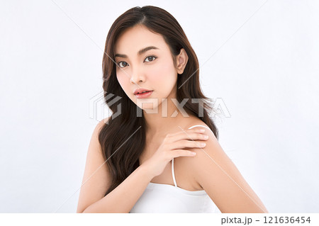Beautiful young asian woman with clean fresh skin on white background, Face care, Facial treatment, Cosmetology, beauty and spa, Asian women portrait. Beautiful young asian woman with clean fresh skin on white background, Face care, Facial treatment, Cosmetology, beauty and spa, Asian women portrait. 121636454