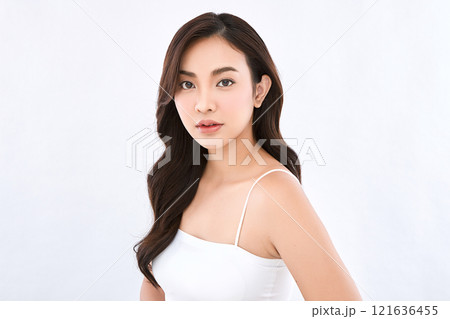 Beautiful young asian woman with clean fresh skin on white background, Face care, Facial treatment, Cosmetology, beauty and spa, Asian women portrait. Beautiful young asian woman with clean fresh skin on white background, Face care, Facial treatment, Cosmetology, beauty and spa, Asian women portrait. 121636455