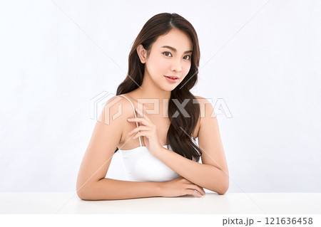 Beautiful young asian woman with clean fresh skin on white background, Face care, Facial treatment, Cosmetology, beauty and spa, Asian women portrait. Beautiful young asian woman with clean fresh skin on white background, Face care, Facial treatment, Cosmetology, beauty and spa, Asian women portrait. 121636458
