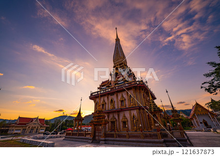 Time lapse colorful sunset above pagoda at Chalong temple 121637873