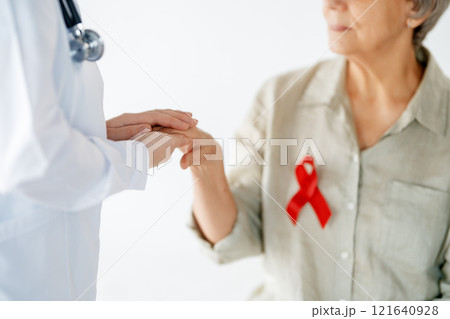 patient and a doctor in medical office 121640928