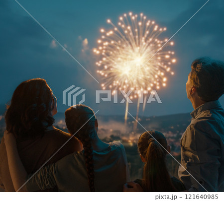family watching fireworks 121640985