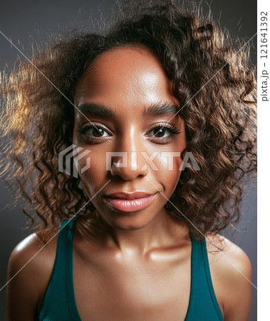 Introspective Beauty with Dark Skin Color in Shadows Introspective Beauty with Dark Skin Color in Shadows 121641392