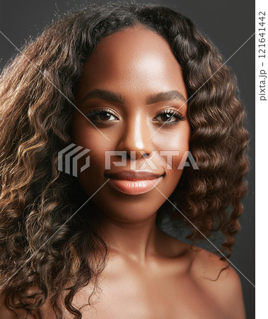 Introspective Beauty with Dark Skin Color in Shadows 121641442