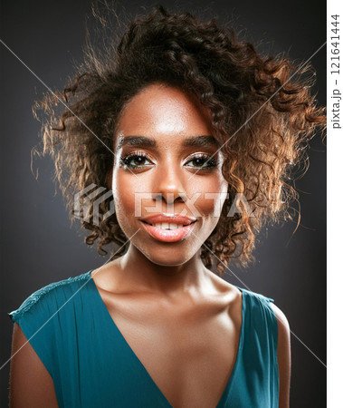 Introspective Beauty with Dark Skin Color in Shadows 121641444