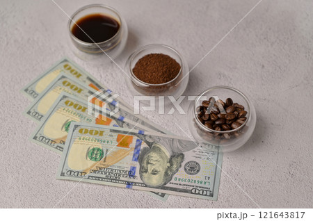 coffee, money, american, dollar, banknote, cash, paper, bean, roasted, ground, price, rise, sell, purchase, buy, white, glass, cup, background, three, set, top, view, robusta, arabica, beans, roast, a coffee, money, american, dollar, banknote, cash, paper, bean, roasted, ground, price, rise, sell, purchase, buy, white, glass, cup, background, three, set, top, view, robusta, arabica, beans, roast, a 121643817