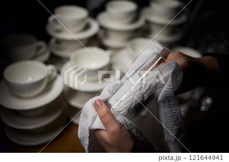 Barista Cleaning Towels Arranged Neatly in a Cozy and Inviting Cafe Setting Atmosphere Barista Cleaning Towels Arranged Neatly in a Cozy and Inviting Cafe Setting Atmosphere 121644941