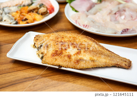 Korean seafood food. Grilled flounder fish 121645111
