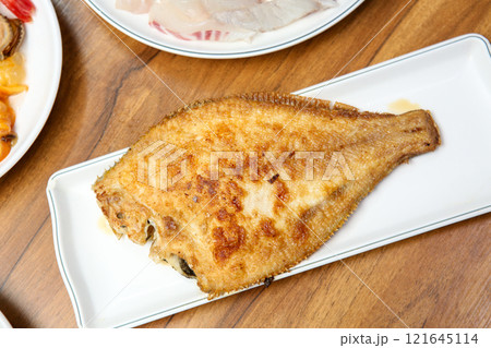 Korean seafood food. Grilled flounder fish 121645114
