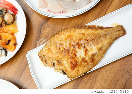 Korean seafood food. Grilled flounder fish 121645116