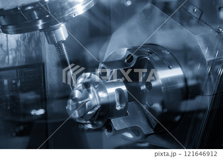 The 5-axis CNC milling machine cutting the automotive part with solid ball end mill tool. The 5-axis CNC milling machine cutting the automotive part with solid ball end mill tool. 121646912
