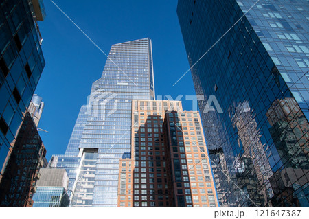 Historic buildings on one of the iconic streets in New York City, Manhattan reportage photography, modern cityscape, famous skyscrapers, Manhattan, NYC, NY, USA Historic buildings on one of the iconic streets in New York City, Manhattan reportage photography, modern cityscape, famous skyscrapers, Manhattan, NYC, NY, USA 121647387