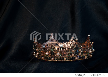 Royal crown for queen and king with gemstones. Symbol of authority Royal crown for queen and king with gemstones. Symbol of authority 121647499